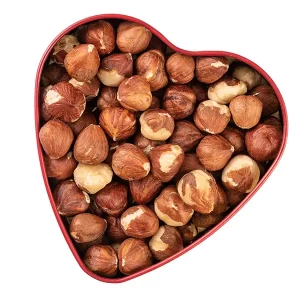 raw hazelnuts with flakes